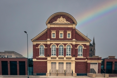 Assembly rooms outside with a rainbow